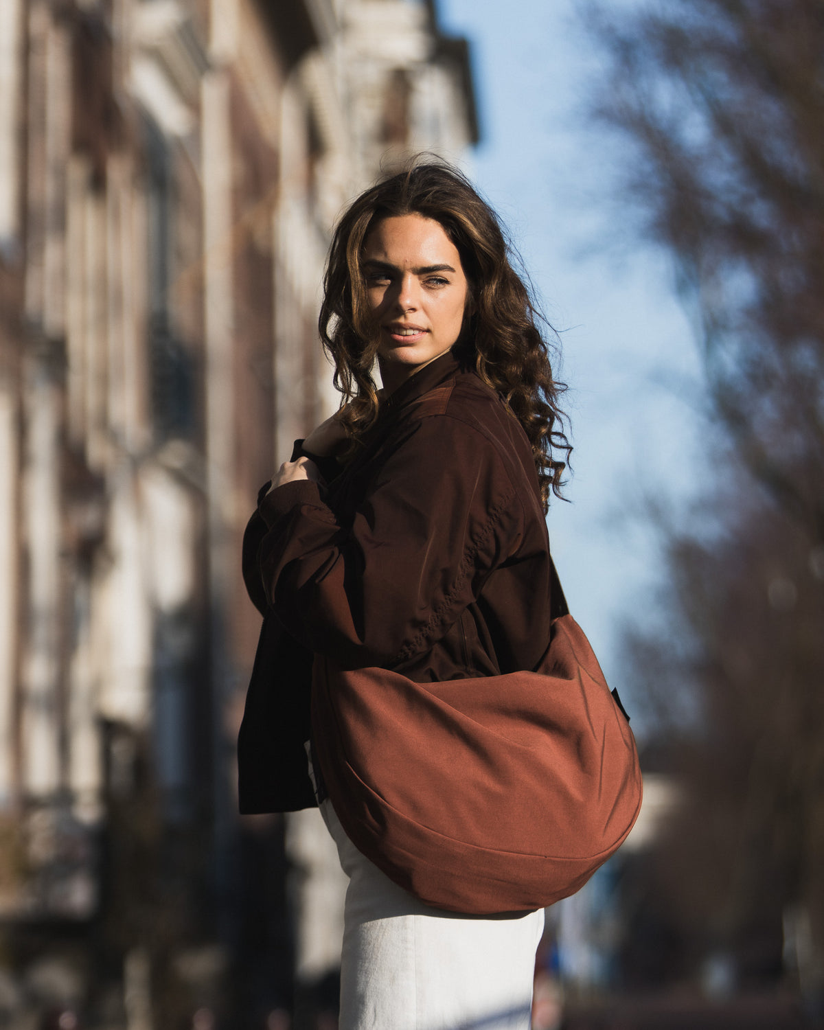 SIV in Terracotta worn across the body